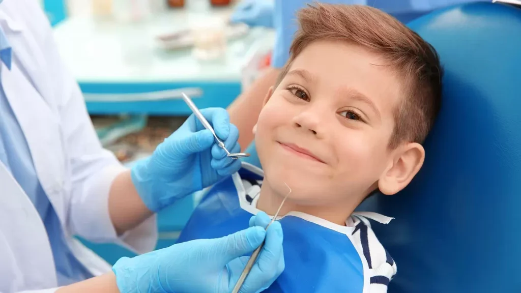 Smiling child at a dentist appointment